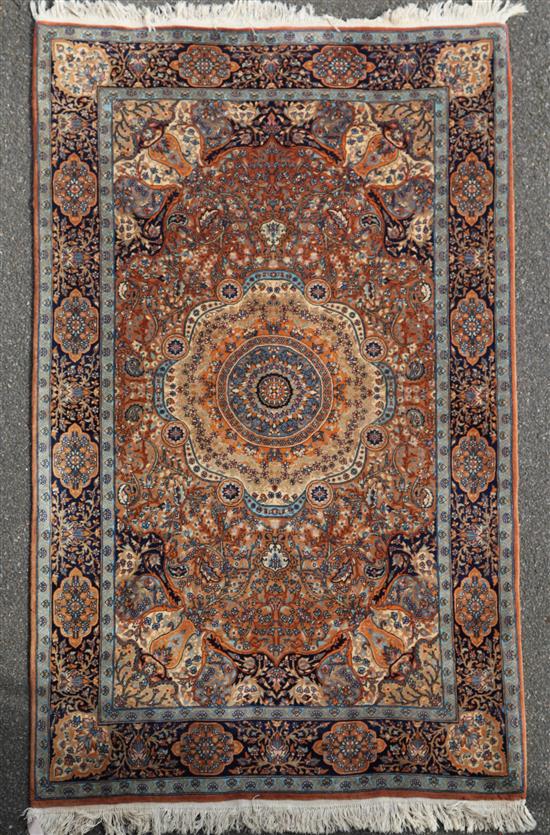 A Persian rug, 7ft 5in by 4ft 8in.